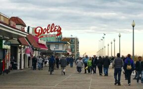 Dolle's Sign over the bustling Rehoboth Beach boardwalk