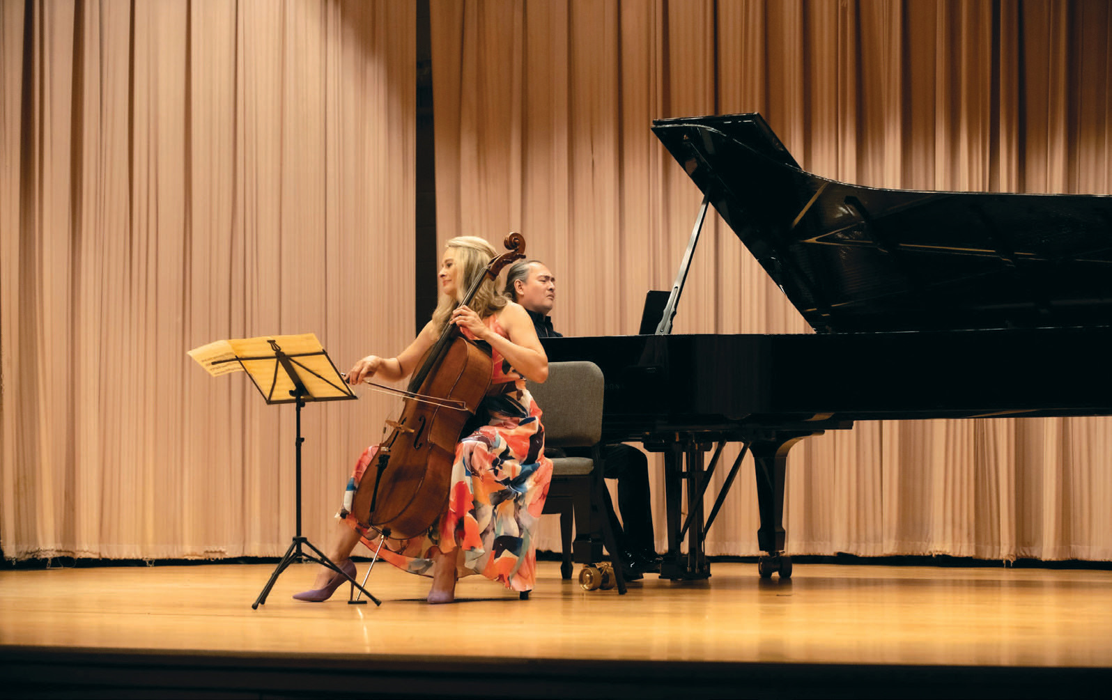 Participating musicians say they gain a sense of camaraderie as they tackle difficult pieces together. Here, cellist Charae Krueger joins pianist Victor Asuncion. 